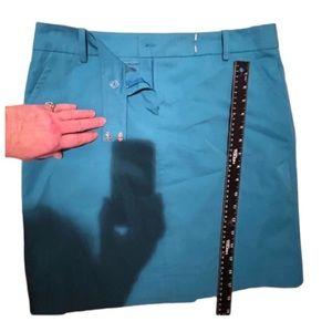 Trina Turk size 12 aqua blue skirt flat zip front with slash pockets